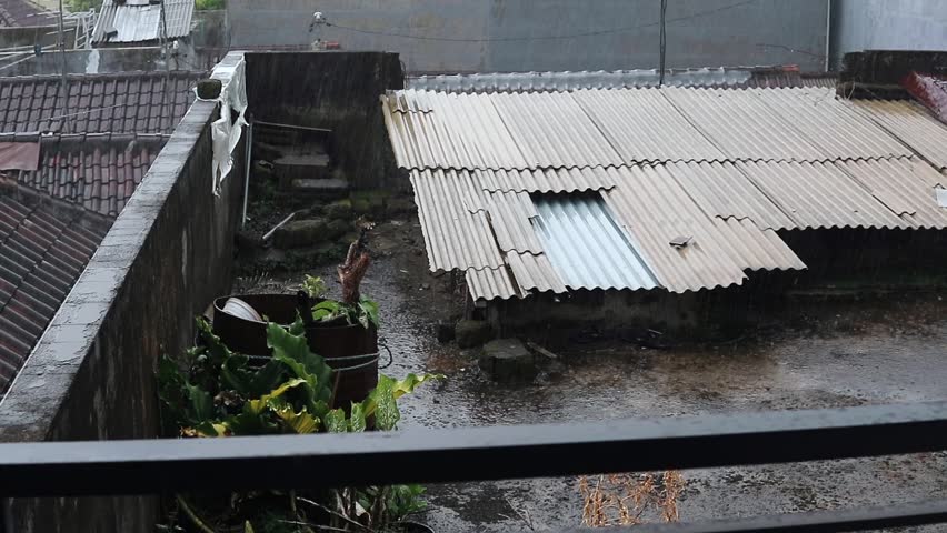 Rain that wets the roof of the house