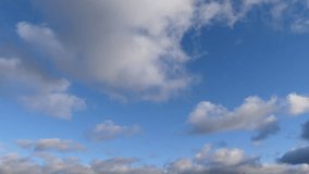 Blue sky, very cloudy. Time lapse. Sky background. Cloudscape.