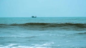 Fishing trawler sailing in the Indian Ocean near the Bay of Bengal in Kuakata waters, Bangladesh