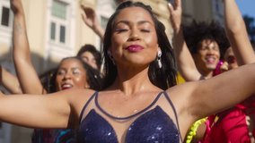 Joyful Celebration at Brazilian Street Carnaval, Energetic Woman with Vivacious Friends Dancing. Exuberance and Festivity with Carnival Costumes in Brazil. - Powered by Shutterstock - Get 15% off with code: PIKWIZARD15