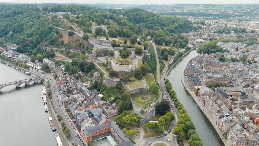 Namur, Belgium. Citadelle de Namur - 10th-century fortress with a park, rebuilt several times. Panorama of the central part of the city. River Meuse. Summer day, Aerial View
