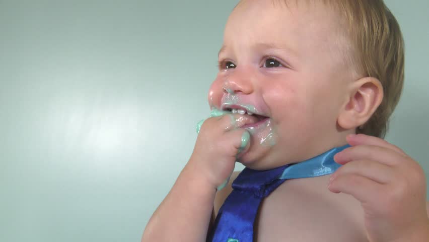 cake smash boy eating and making a mess 4k