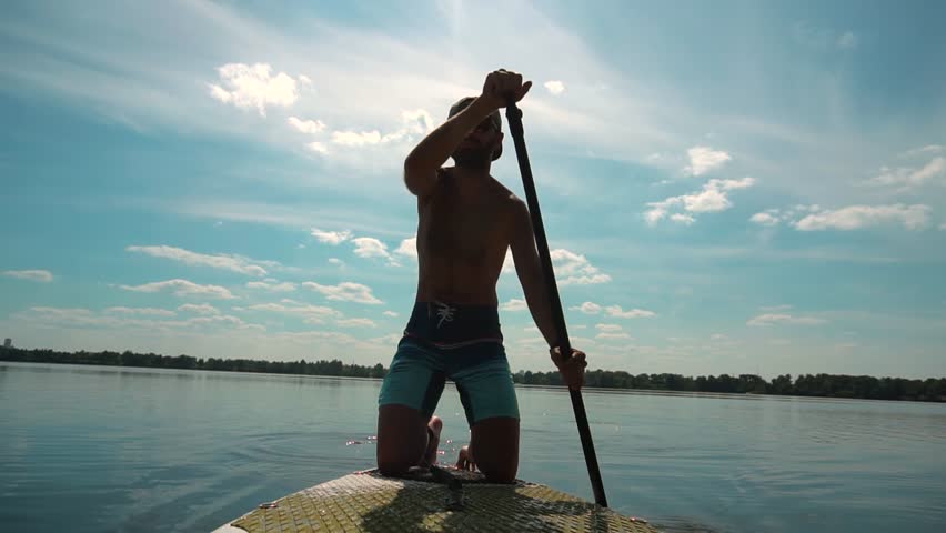 Paddleboarder Sport Sup Surfing. Recreation Paddling Sup Surfboard. Inflatable Board Rowing. Surfer Recreation Sport Watersport Activity.Travelling Water Tourism.Raft SUP. Paddler Surfing Exploration Royalty-Free Stock Footage #3404069313