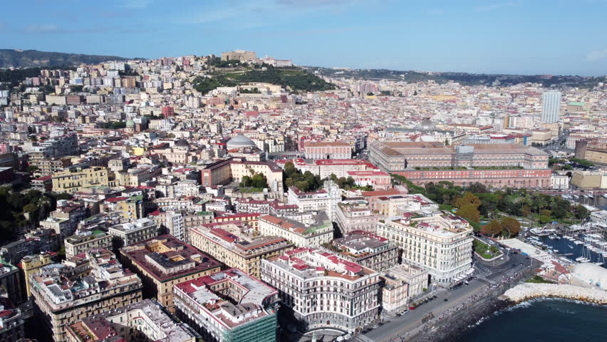 Beautiful urban landscape of Naples, Italy. Historic buildings on coastal. Aerial cityscape.