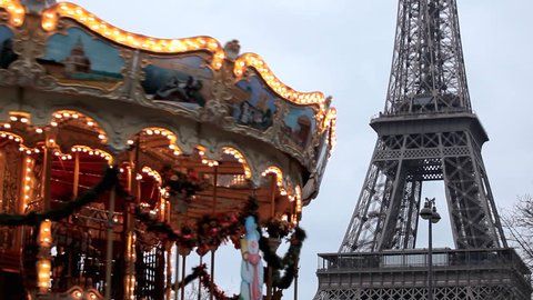 Eiffel Tower and Carousel (merry go round) in Paris, France, French Architecture