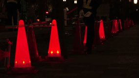 TOKYO, JAPAN : View of road construction at night. Flashing safety cone at the street. Japanese traffic, transportation and construction site concept video. - Powered by Shutterstock - Get 15% off with code: PIKWIZARD15