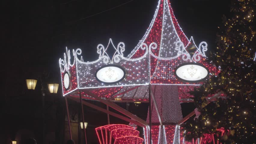 Closeup Shot to Merry-Go-Round Lightened at Night in Neon Lights, Warsaw Poland