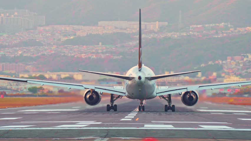 Jet Airplane take off from the Airport at sunset, tourism and travel concepts, modern aviation