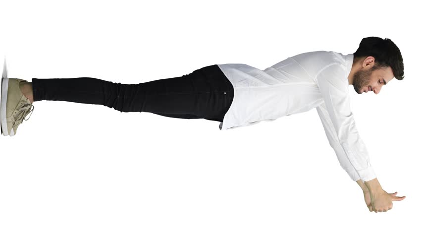 man on a white background. in full height. shows thumbs up sign, in profile