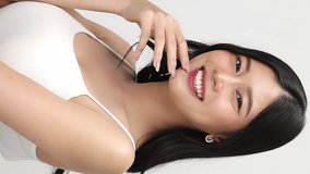 Close up face of young beautiful young Asian woman with healthy and fresh skin. Vertical beauty footage. - Powered by Shutterstock - Get 15% off with code: PIKWIZARD15