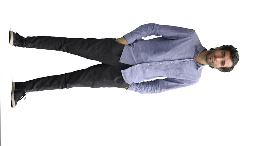 full-length portrait of a young man. standing isolated on white background