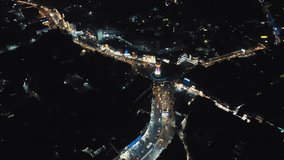 A drone captured an aerial view of Dehradun, a modern Indian city with skyscrapers and flashing lights at night. The footage shows top-angle views of the city's roads in Uttarakhand.