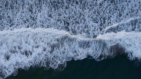 Nature video Amazing Blue ocean wave Top-down Aerial view shot. Professional footage. Nature and Travel concept.