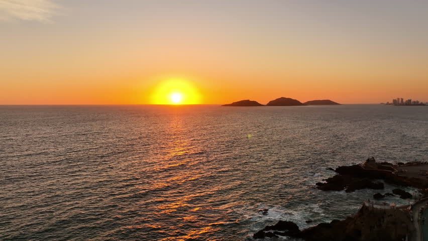Aerial view of calm rocky coast of Mazatlan, sunny evening in Sinaloa, Mexico