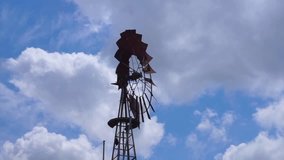 Video of retro windmill with cloudy blue sky - Powered by Shutterstock - Get 15% off with code: PIKWIZARD15
