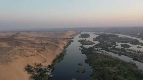 Scenic Aerial Drone shot of Nile River and West Bank and Desert in Aswan, Egypt Stockvideó