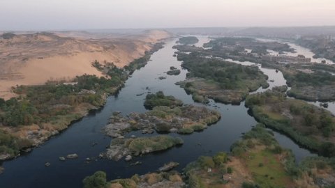 Rare Aerial Panning Fly through over Nile River in Aswan, Egypt at Sunrise Stockvideó