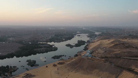 Rare Aerial Panning Drone Shot of Aswan and Nile River at Sunrise Stockvideó