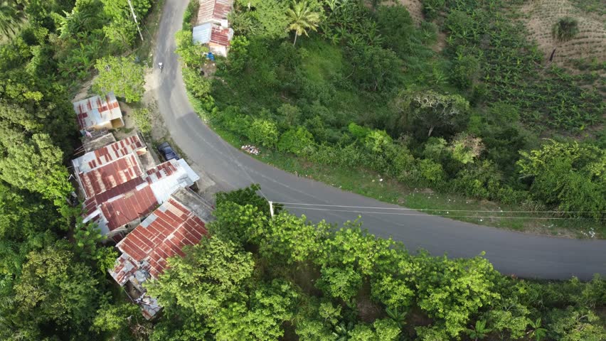 Aerial view of a road in rural area near the city of Santiago in the Dominican Republic