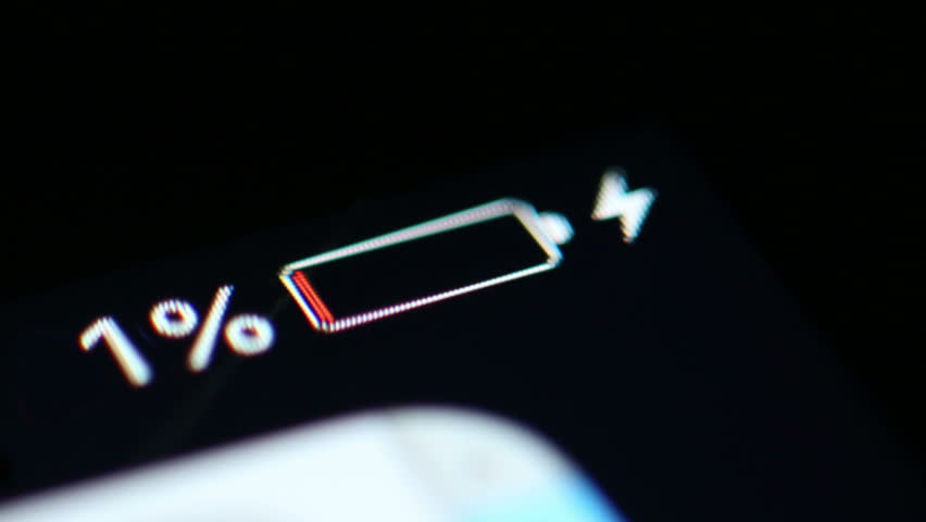 Time Lapse: A Smartphone Battery Is Charged From Zero to 100%. Close up macro shot of the battery level indicator on a smart phone being charged in time lapse. Royalty-Free Stock Footage #34052467