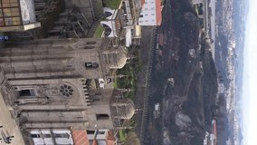 Porto, Portugal: Aerial view of the center of a famous historical European city and Porto Cathedral, vertical footage
