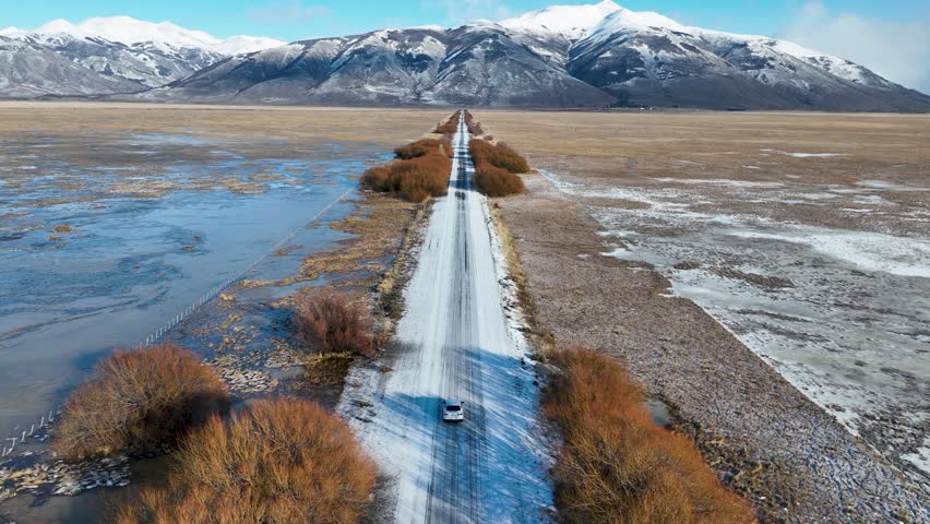 Country Road At El Calafate Patagonia Argentina. Intersection El Calafate Patagonia. Wild Lake Iceland Mountain. Wild Forest Trees Iceland Frosty Nature. Wild Mountain Snow Fall Nature Landscape. Royalty-Free Stock Footage #3405318969