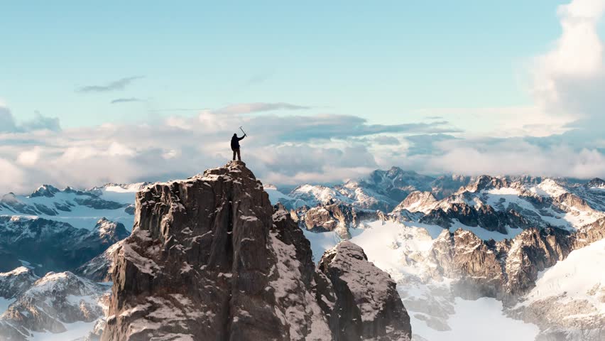 Adventure Man on top of Rocky Mountain Cliff. Aerial Canadian Mountain landscape from British Columbia in Background. 3d Rendering Peak.