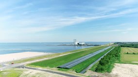 Power Plant, Solar Panels, Storage Containers - Flevoland, The Netherlands, 4K Drone Footage
