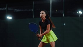 Attractive Woman Tennis Player Hitting Ball By Racket, Medium Portrait In Slow Motion, Training - Powered by Shutterstock - Get 15% off with code: PIKWIZARD15