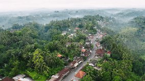 A small town in the tropics in Bali, drone video.