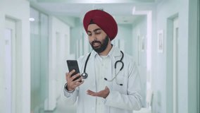 Angry Sikh Indian doctor talking on video call