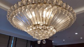 Bright Indoor Decorative Hanging Lightbulbs with crystal ornaments. Retro vintage style luxury lamp with metal golden frame for hotel, office, hall, ballroom, meeting, housing, family and living room. - Powered by Shutterstock - Get 15% off with code: PIKWIZARD15