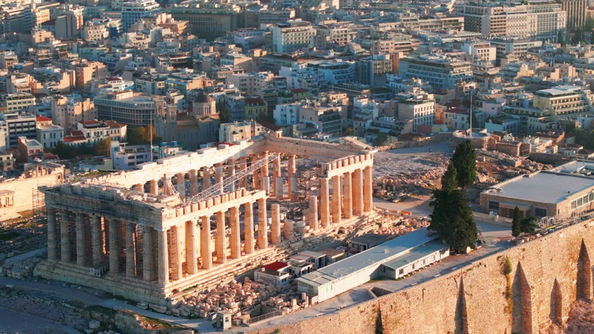 Tight circling aerial shot of the Parthenon undergoing repairs Athens