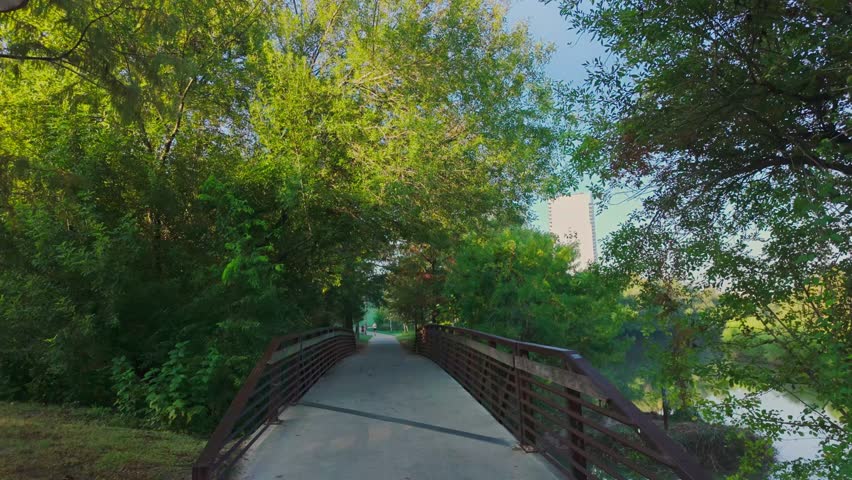 Walking a bridge in Bayou Buffalo Park in Houston, Texas