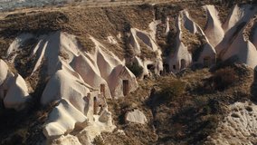 Mesmerizing stock video capturing the essence of Cappadocia's cave dwellings near Goreme, Turkey.