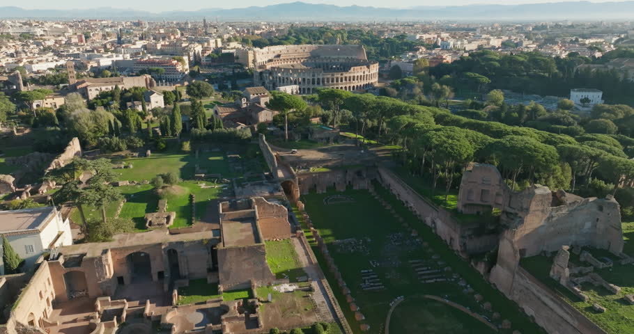 Aerial view Temple Palatin Rome Italy. Ruins of an old ancient castle on top of a mountain in a cityscape, ancient civilizations and architecture, tourist points. High quality 4k footage