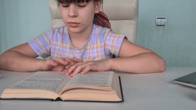 Dependent child teenage girl with smartphones refuses to read book. Pupil surfing at school