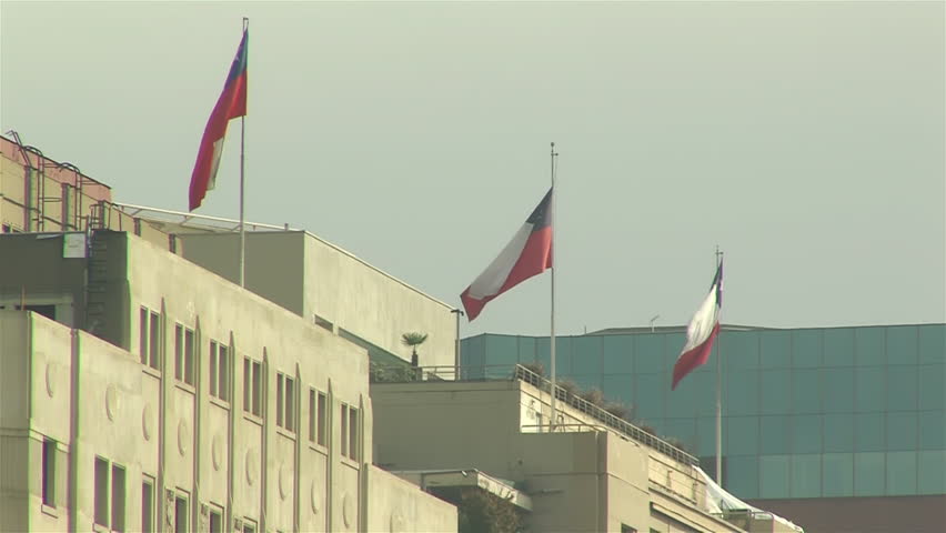 Flags of Chile on the Roof of a Building near La Moneda Palace in Santiago, Chile. 