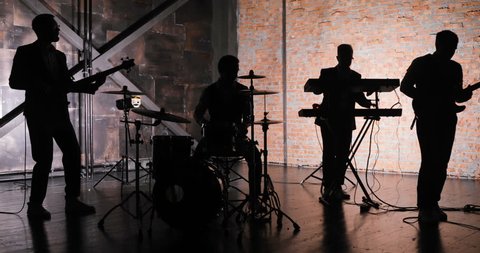 Rock music concert stage. Musical rock show. Rock music band concert. Music concert rock group. Concert musicians stage. Music band silhouette