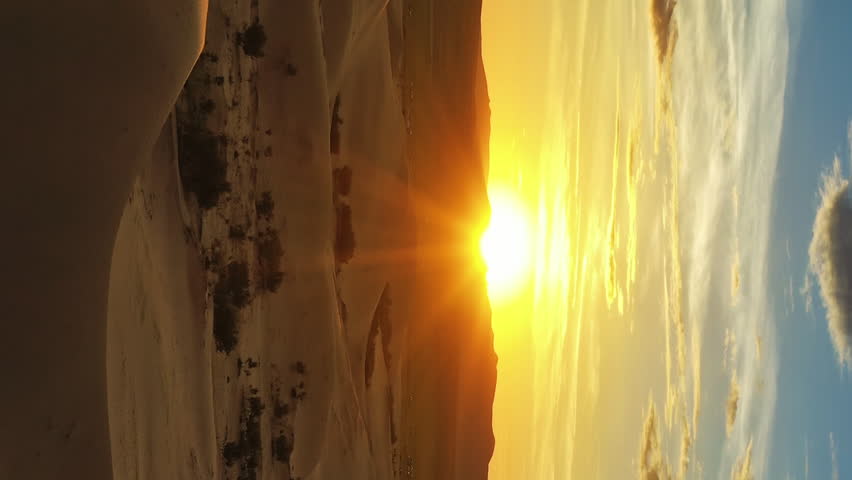 Aerial view of beatiful sunrise in desert, Mongolia. Vertical video