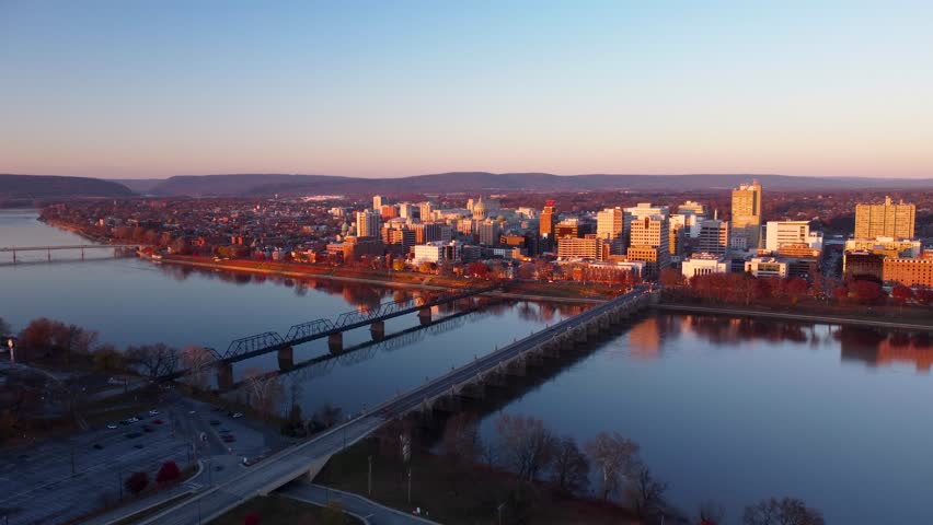 A 4k aerial video with a push-in camera motion of the bridges leading into downtown Harrisburg Pennsylvania.