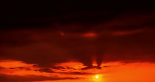 Time lapse sunset, natural golden colors with nice sky, fast motion clouds in horizon.