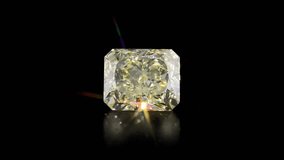 Emerald cut diamond stone, black background, sparkling in the light - Powered by Shutterstock - Get 15% off with code: PIKWIZARD15