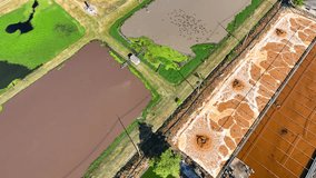 The industrial wastewater treatment pond utilizes physical, chemical, and biological processes to remove impurities from industrial effluents, ensuring compliance with environmental regulations.
