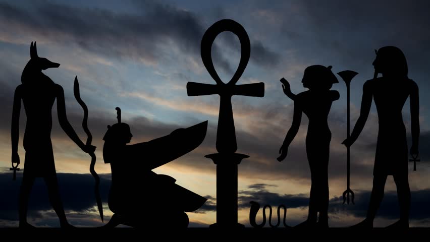 Hieroglyphic with Key of Life, Time Lapse at Sunrise with Fast Clouds and Dark Silhouette of Egyptian Simbols