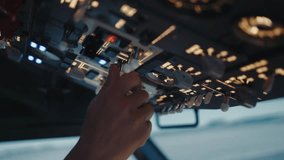 Hand of Airplane Pilot Using Control Panel in Plane Cockpit Close-Up. Aviator Using Technology in Aircraft Cabin to Flight Study. Ready Man Preparing to Fly Off Airport and Turning Switches Closeup 4k - Powered by Shutterstock - Get 15% off with code: PIKWIZARD15