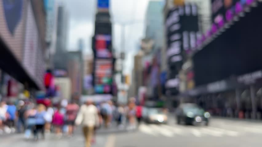 new york, blurred surface or background video with people walking on the street at times square in New York, United states of America. Landmarks of NYC in America. American Lifestyle 4k footage