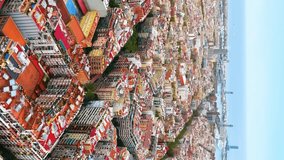 Aerial view of typical buildings of Barcelona cityscape. Catalonia, Spain. Aerial vertical background, vertical video background, vertical video,