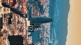 Aerial view of Barcelona City Skyline. Aerial view of Barcelona Urban Skyline. Catalonia, Spain. Aerial vertical, vertical video background.