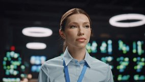 Portrait businesswoman posing database center. System administrator lady looking camera crossed arms at cyber security office closeup. Serious woman professional in formal wear staring at server room - Powered by Shutterstock - Get 15% off with code: PIKWIZARD15